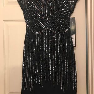 Sparkle in this black beaded party dress!